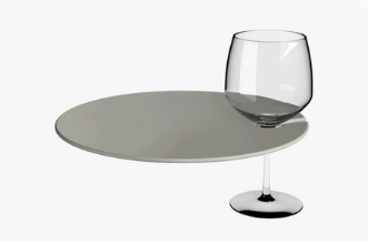 Wine glass hooked onto a small plate for one handed dining and sipping
